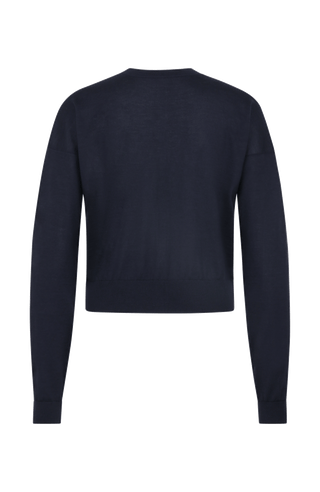 Luxuriöse Damen-Strickjacke aus Wolle, Kaschmir und Seide mit lockerem, leicht verkürztem Schnitt. Besonders weich auf der Haut, mit klassischen Rundhalsausschnitt und Rippbündchen an Ärmeln und Saum. Vielseitig kombinierbar für elegante oder lässige Looks.