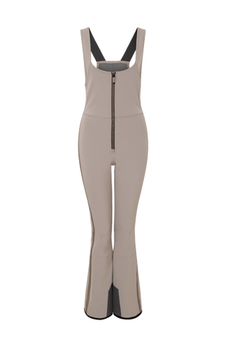 Ski-Catsuit Davina2.0-S im Latzhosen-Stil ohne Ärmel, schmaler figurbetonter Schnitt mit ausgestelltem Bein und femininer Bustier-Ausschnitt. Streifen an den Beinaußenseiten aus Alcantara-Leder, Träger hinten aus elastischem Gummi, ergonomisches Knie, langer Zipper, auffallende Nähte, Seitentaschen mit Zip, Kantenschutz aus Alcantara-Leder und Schneefang. Enganliegend und feminin, betont die Silhouette und Bewegungsfreiheit. In der Farbe Beige (Farbe: cashmere)