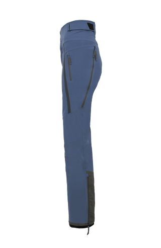 Damen-Skitourenhose aus atmungsaktivem, wind- und wasserfestem 3-Layer-Material mit RECCO®-System, verschweißten Nähten, seitlichen Bein-Zippern, Schneefang, robustem Kantenschutz aus Alcantara-Leder und lockerem Schnitt. In der Farbe Blau (Farbe: denim)